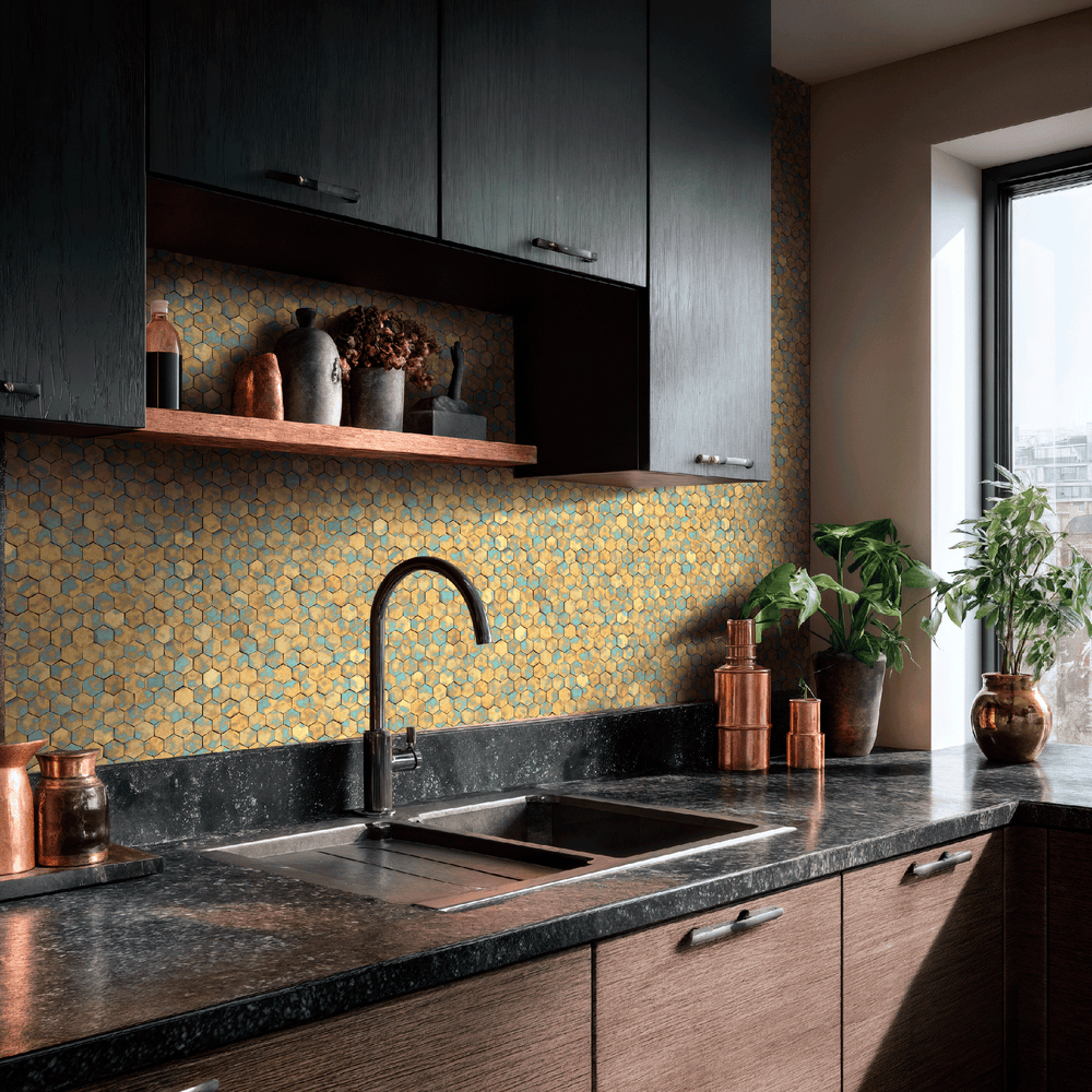 Hex copper geometric tile wallpaper in modern kitchen backsplash with black countertop and wooden cabinets