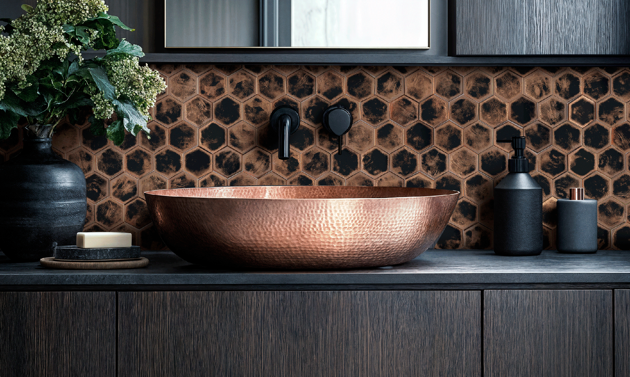 dark moon hex geometric copper tile wallcovering behind copper sink in modern bathroom