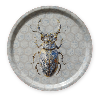 Small round birchwood tray featuring an artistic Lucanidae design, handcrafted in Sweden.